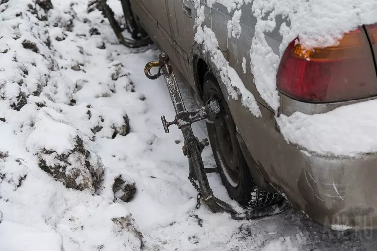 Фото: В Кемерове начали эвакуировать мешающие уборке снега автомобили 15