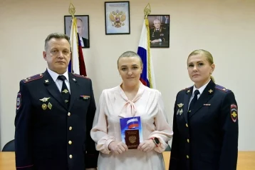 Фото: В Кузбассе российский паспорт получила участница программы по переселению 1