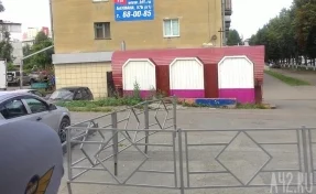 Мэр Кемерова поручил снести заросший травой ларёк в центре города