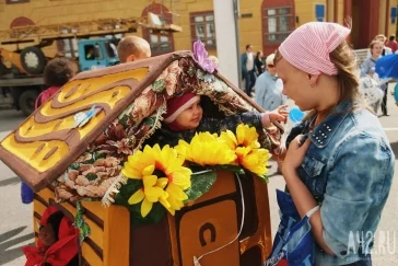 Фото: Акула и экомобиль: в Кемерове состоялся парад колясок 4