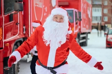 Фото: «Рождественский караван Coca-Cola» посетил Кемерово 1