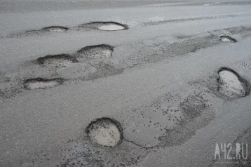 Фото: Жители Кузбасса пожаловались на состояние единственной дороги между двумя посёлками 1