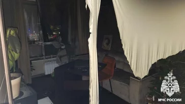 Фото: В Кемерове на пожаре на бульваре Строителей спасли 23 человека 2