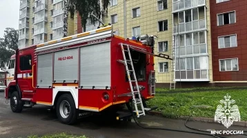 Фото: Женщину с двумя детьми спасли из пожара в 10-этажном доме в Кемерове 1