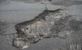 «В судебном порядке»: власти и горожане пытаются разобраться, кто должен ремонтировать дорогу в «Кемерово-Сити»