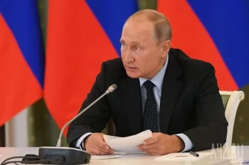 Фото: Владимир Путин подписал закон о создании свободной экономической зоны в приграничных с Украиной областях 1