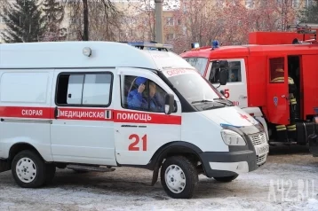 Фото: Семь пожарных машин выехали на тушение возгорания в центре Кемерова 6
