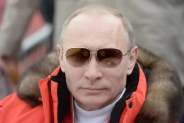 Фото: Путин: я переживаю за наших спортсменов 1