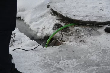 Фото: В Белове запустили дополнительные насосы для откачки воды из подвалов 2