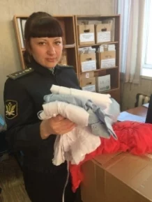 Фото: В Кузбассе судебные приставы изъяли детские платья и блузки 1