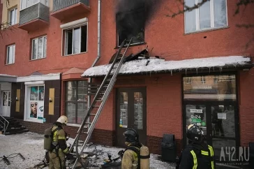 Фото: В Кемерове загорелась квартира в центре города 2