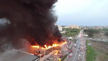 Фото: Пожар в кемеровском автосалоне сняли с квадрокоптера 1