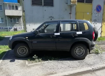 Фото: В Кузбассе у стройфирмы арестовали машину за долг по зарплате бывшей сотруднице 1