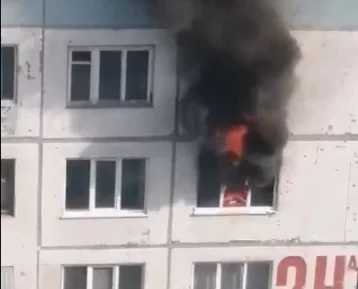 Фото: Опубликовано видео серьёзного пожара в кемеровской многоэтажке 1