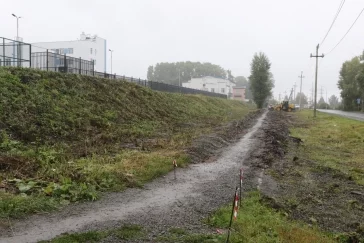 Фото: В Кемерове начали делать тротуары в районе новой школы на улице Антипова 2