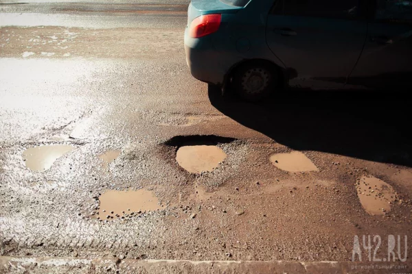 Суд обязал администрацию Кемерова принять в собственность и отремонтировать дорогу