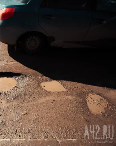 Суд обязал администрацию Кемерова принять в собственность и отремонтировать дорогу