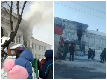 Фото: 75 детей эвакуировали из здания загоревшейся школы в Кузбассе 1