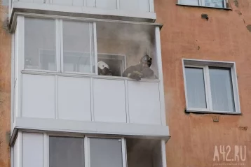 Фото: Стали известны подробности пожара в центре Кемерова 3
