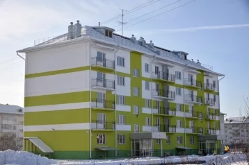 Фото: В Кузбассе 75 семей получили квартиры в новых домах 1