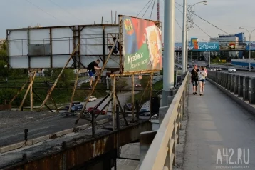 Фото: Кемеровские спасатели выгнали детей со старого моста 1