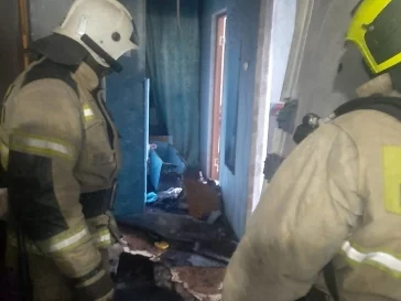Фото: В Кузбассе сотрудник Росгвардии спас людей на пожаре в многоэтажке 2