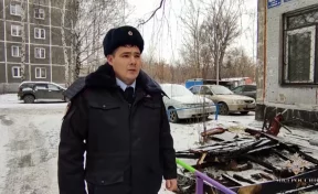 Глава МВД России наградил кузбасского полицейского, спасшего девушку из горящей квартиры