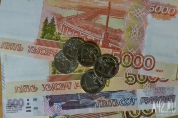 Фото: Кемеровчанин забрал из банкомата чужие 40 000 рублей 1