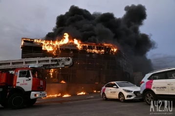 Фото: Стала известна сумма ущерба от пожара в кемеровском автосалоне 1