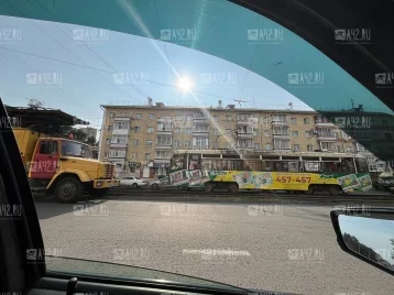 Фото: Очевидцы: в Кемерове на улице Дзержинского встали трамваи 1