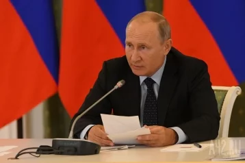 Фото: Путин выразил соболезнования семьям погибших при крушении Ил-20 в Сирии  1