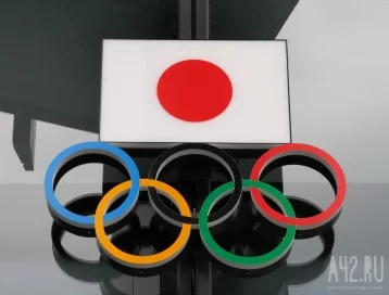 Фото: Олимпийскому чемпиону Игр в Токио-2020 подарили миллион долларов 1