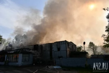 Фото: Названа предварительная причина крупного пожара на Тухачевского в Кемерове 1