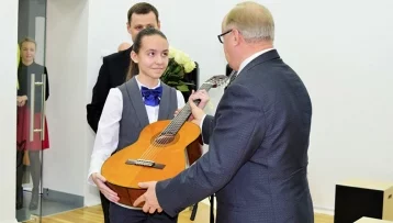 Фото: Путин подарил петербургской школьнице её мечту 1