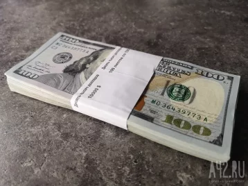 Фото: В Кузбассе 68-летняя учительница отдала мошенникам 25 тысяч долларов 1
