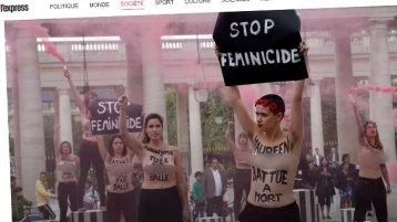 Фото: Полуголые феминистки провели массовую акцию возле Лувра 1