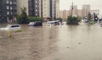 Фото: Потоп в Красноярске: в городе объявили режим ЧС, людей эвакуируют 1