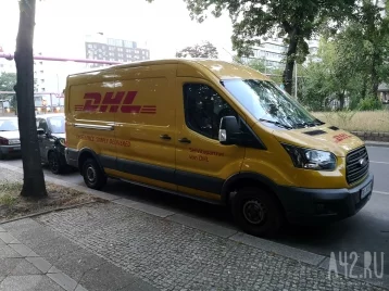 Фото: DHL Express заявила, что с сентября прекращает доставку грузов и документов внутри России 1