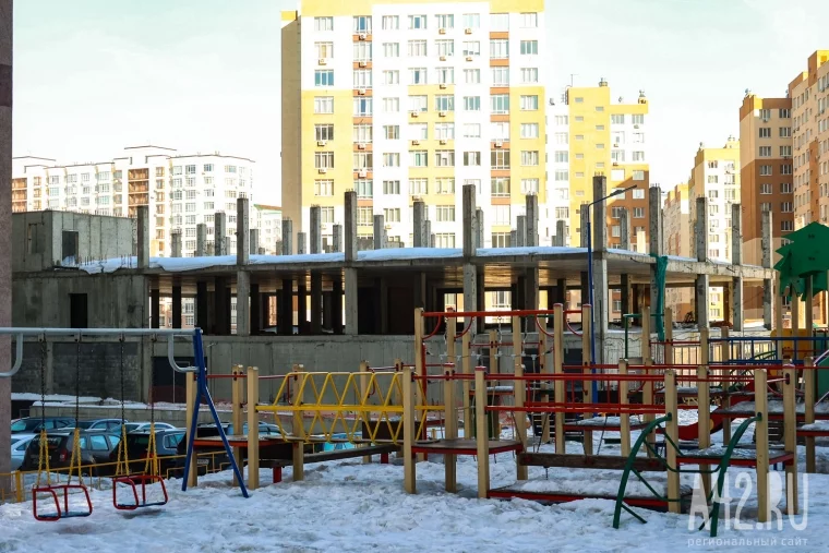 Фото: Парковочный комплекс, обманутые люди и 131 миллион ущерба: как в Кемерове два года не могут снести незаконный недострой 11