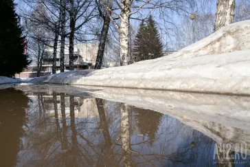Фото: Кемеровчане возмущены затопленной улицей в центре города 5