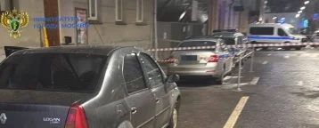 Фото: В Москве пенсионер кинул коктейль Молотова в полицейскую машину 1