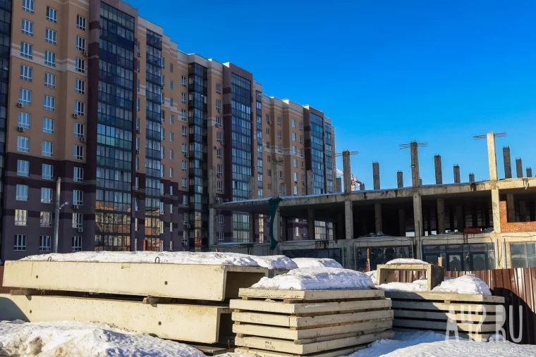 Фото: Парковочный комплекс, обманутые люди и 131 миллион ущерба: как в Кемерове два года не могут снести незаконный недострой 19