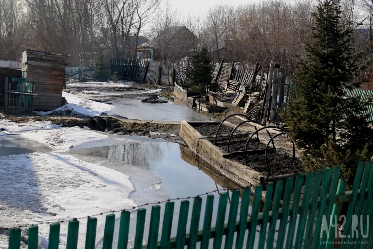 Фото: Дело не только в снеге: почему Кемерово топит в неожиданных местах  13