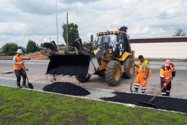 Фото: В Кемерове на улице Гагарина начали асфальтировать тротуары 2