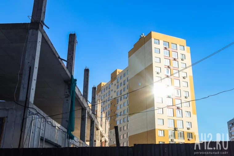 Фото: Парковочный комплекс, обманутые люди и 131 миллион ущерба: как в Кемерове два года не могут снести незаконный недострой 14