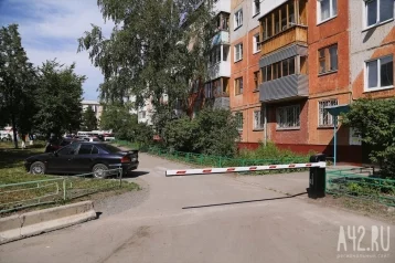 Фото: Жители Кемерова спорят из-за новых шлагбаумов в центре города 1