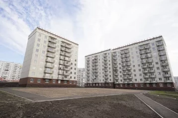 Фото: В Новокузнецке 102 человека получили ключи от новых квартир, их вручил Илья Середюк 1