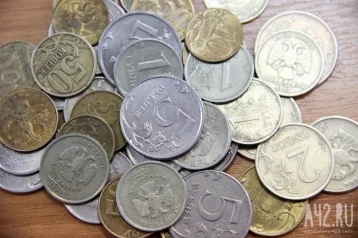 Фото: Кузбассовцы принесли в банки 1,3 тонны монет для обмена на купюры 1