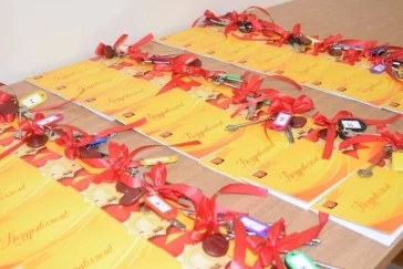 Фото: В Кузбассе 25 детей-сирот получили квартиры в новом доме 2