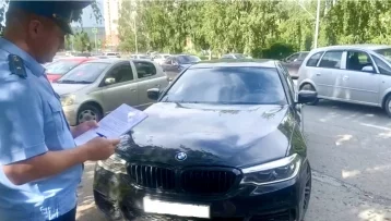 Фото: У кемеровчанина арестовали автомобиль BMW X5 за долг в 1,7 млн рублей 1